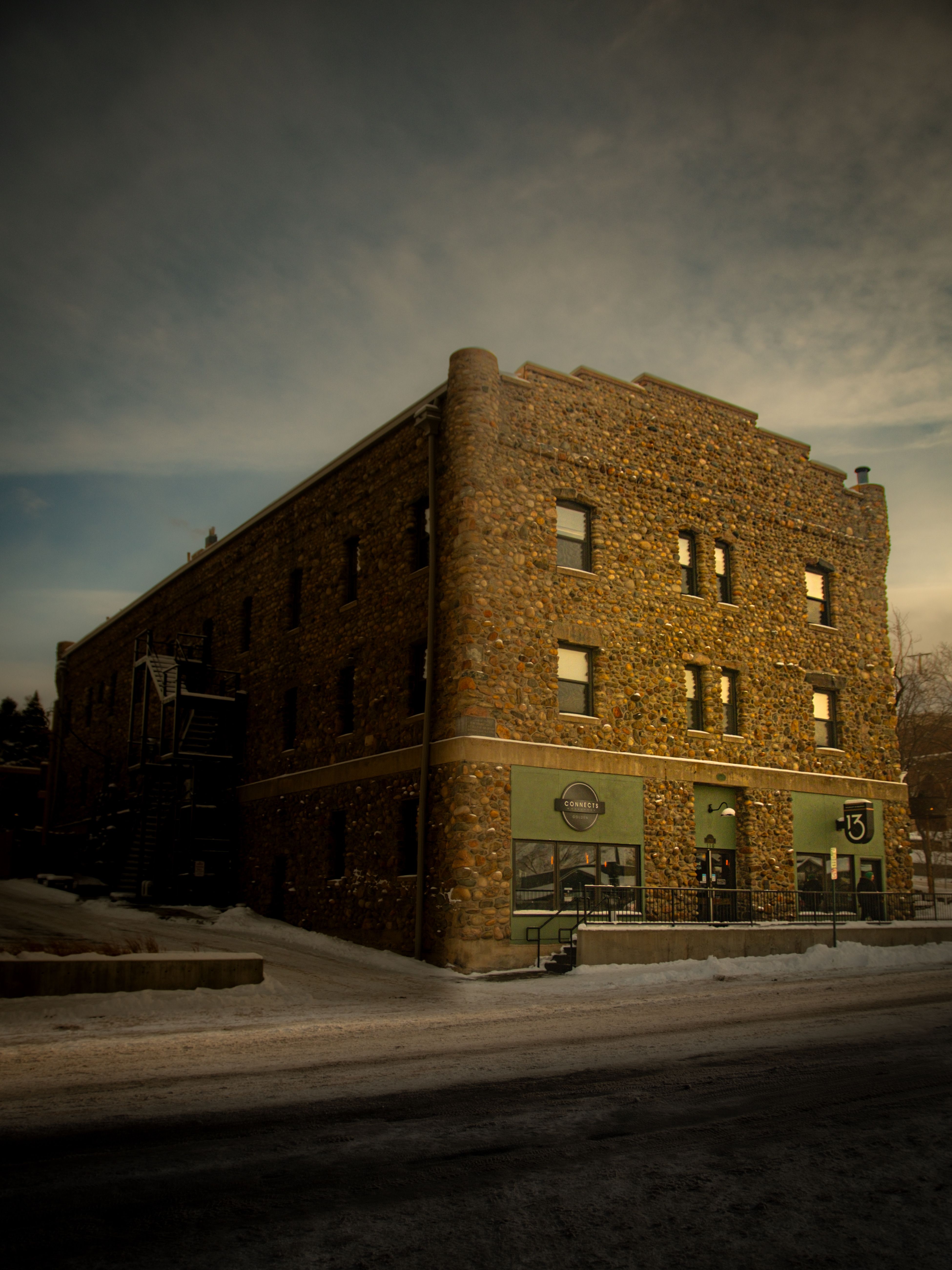 Historic Stone Building in Winter Evening Light · Free Stock Photo