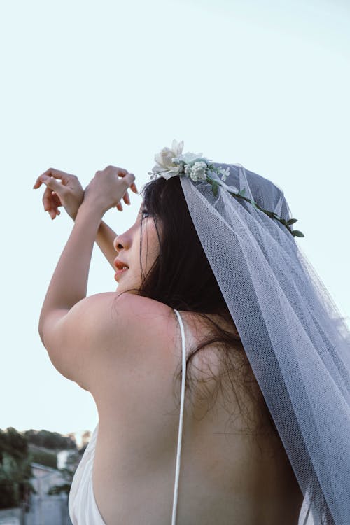 Free Woman Wearing White Wedding Veil Stock Photo