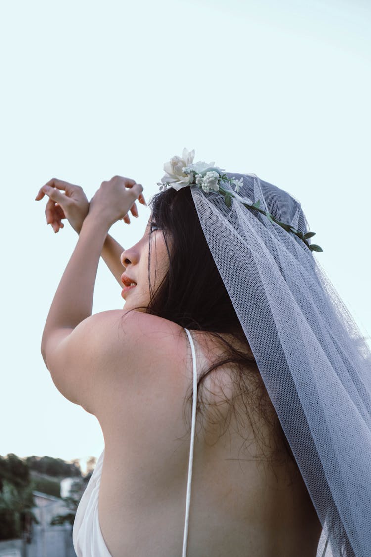 Woman Wearing White Wedding Veil