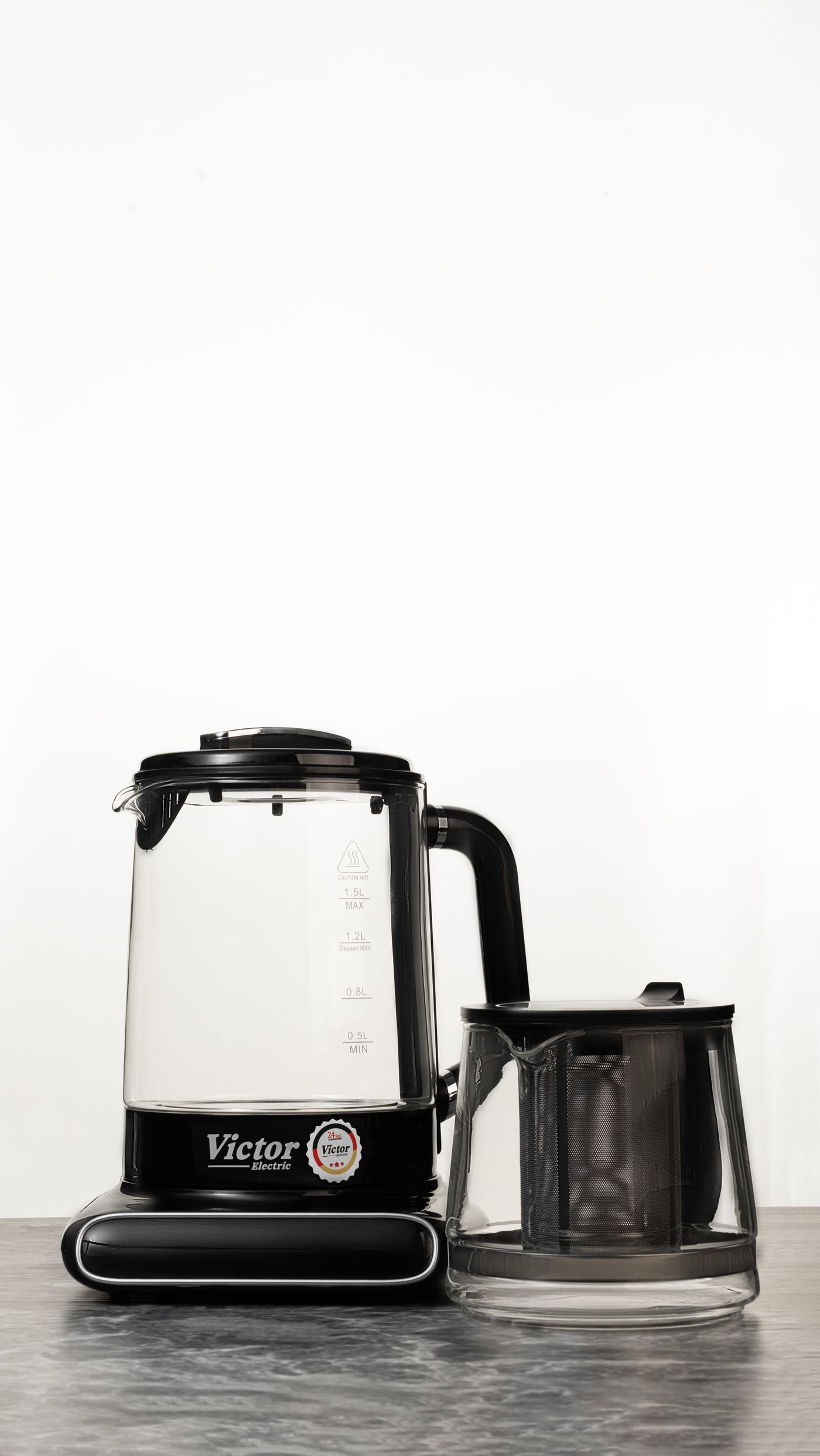 Modern glass electric kettle on a kitchen countertop