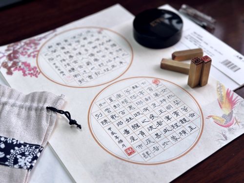 Free Close-up of traditional Chinese calligraphy with stamps, showcasing artistic cultural heritage. Stock Photo