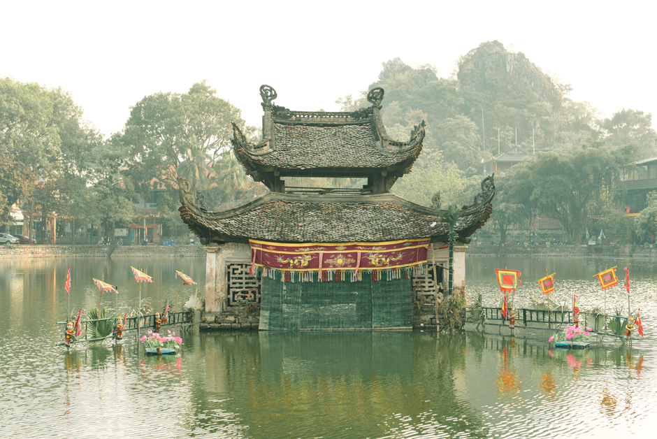 Puppets performing in a traditional water puppet show at Thang Long Water Puppet Theatre in Hanoi, Vietnam