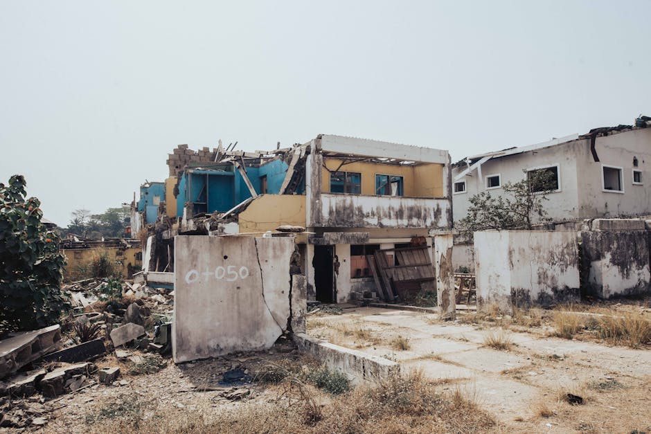 A scene of building destruction in Ibadan, Nigeria, showcasing structural collapse.