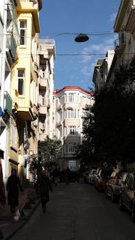 Discover a picturesque street in Istanbul with unique architectural charm and vibrant city life.