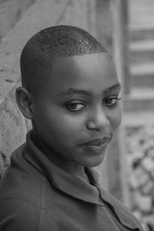 Free A captivating black and white portrait of a young woman in Southern Province, Rwanda. Stock Photo