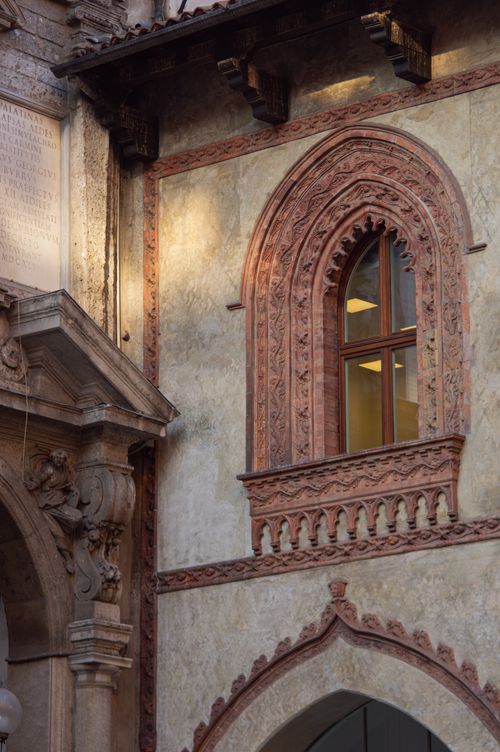 Free Close-up of a Gothic-style window and facade in Milan, Italy. Stock Photo