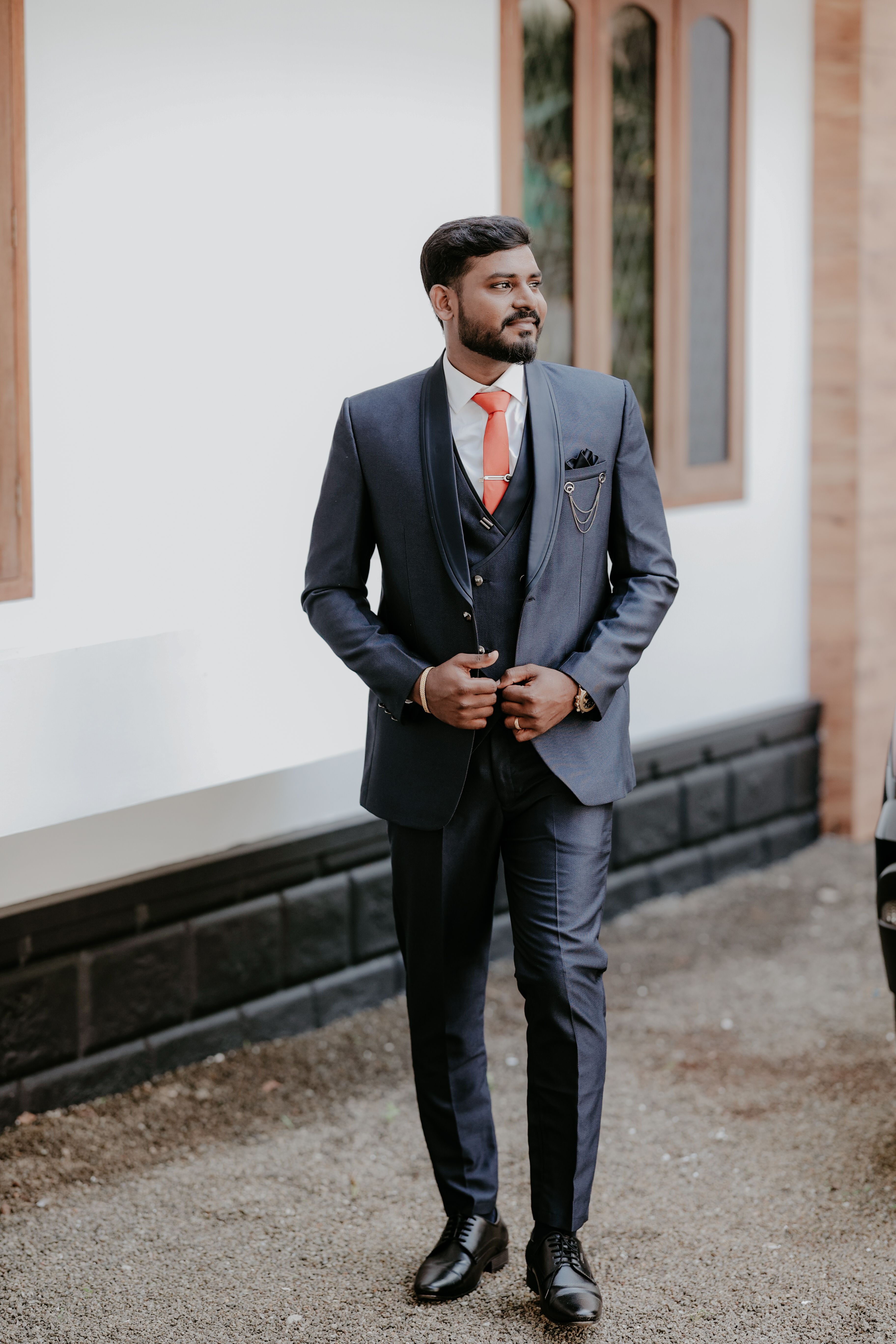 Elegant Indian Groom in Blue Suit with Orange Tie  Free Stock Photo