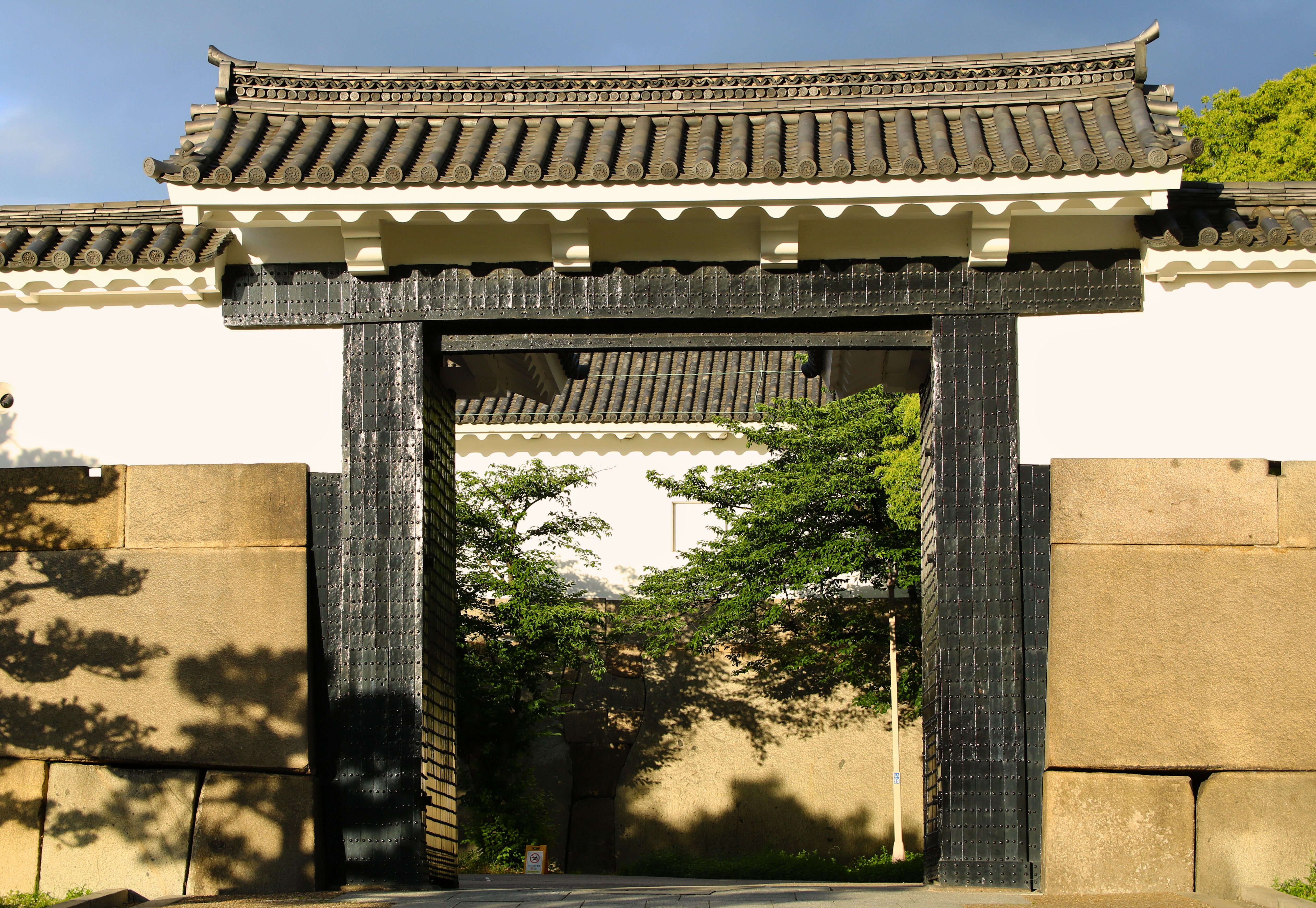 Explore the architectural beauty of Osaka Castle's historic gate.
