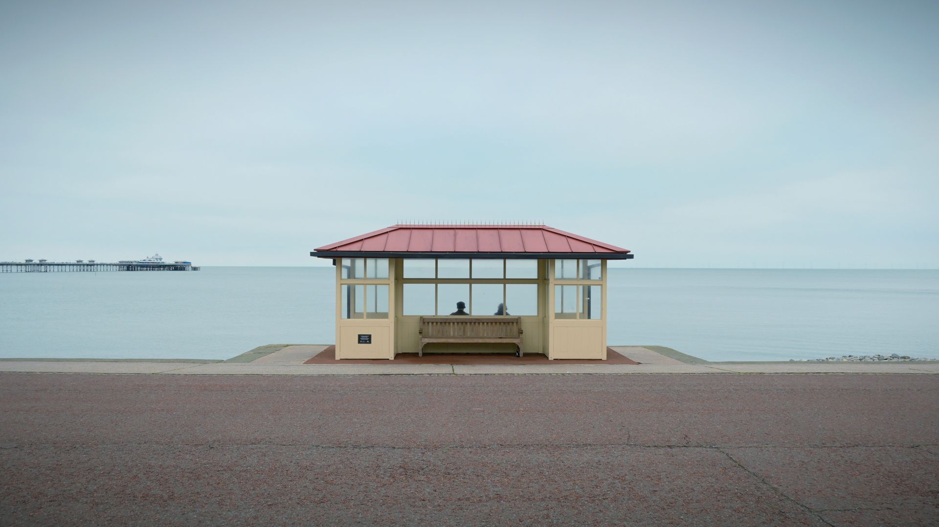 A tranquil seaside shelter with an ocean view, perfect for relaxing moments.