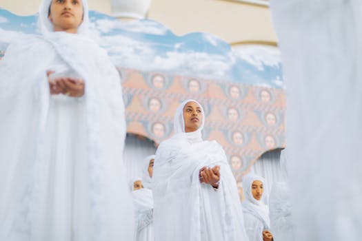 Orthodox church ceremony with worshippers in traditional attire, Addis Ababa, Ethiopia.