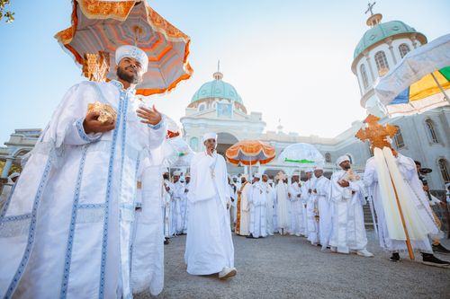 Free Orthodox religious procession at a church in Addis Ababa, Ethiopia, showcasing traditional attire and rituals. Stock Photo