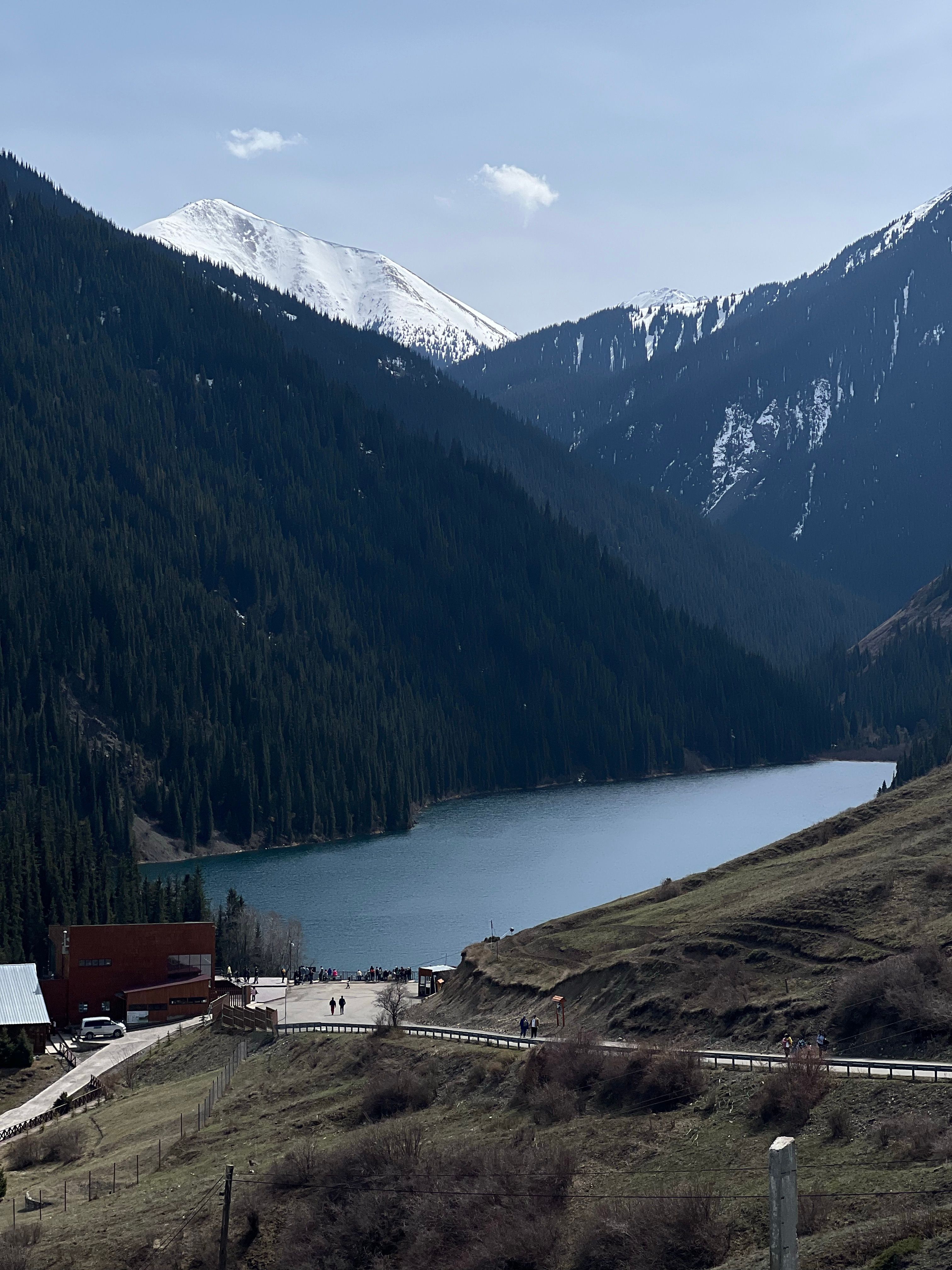 Scenic Mountain Lake View with Snowy Peaks · Free Stock Photo