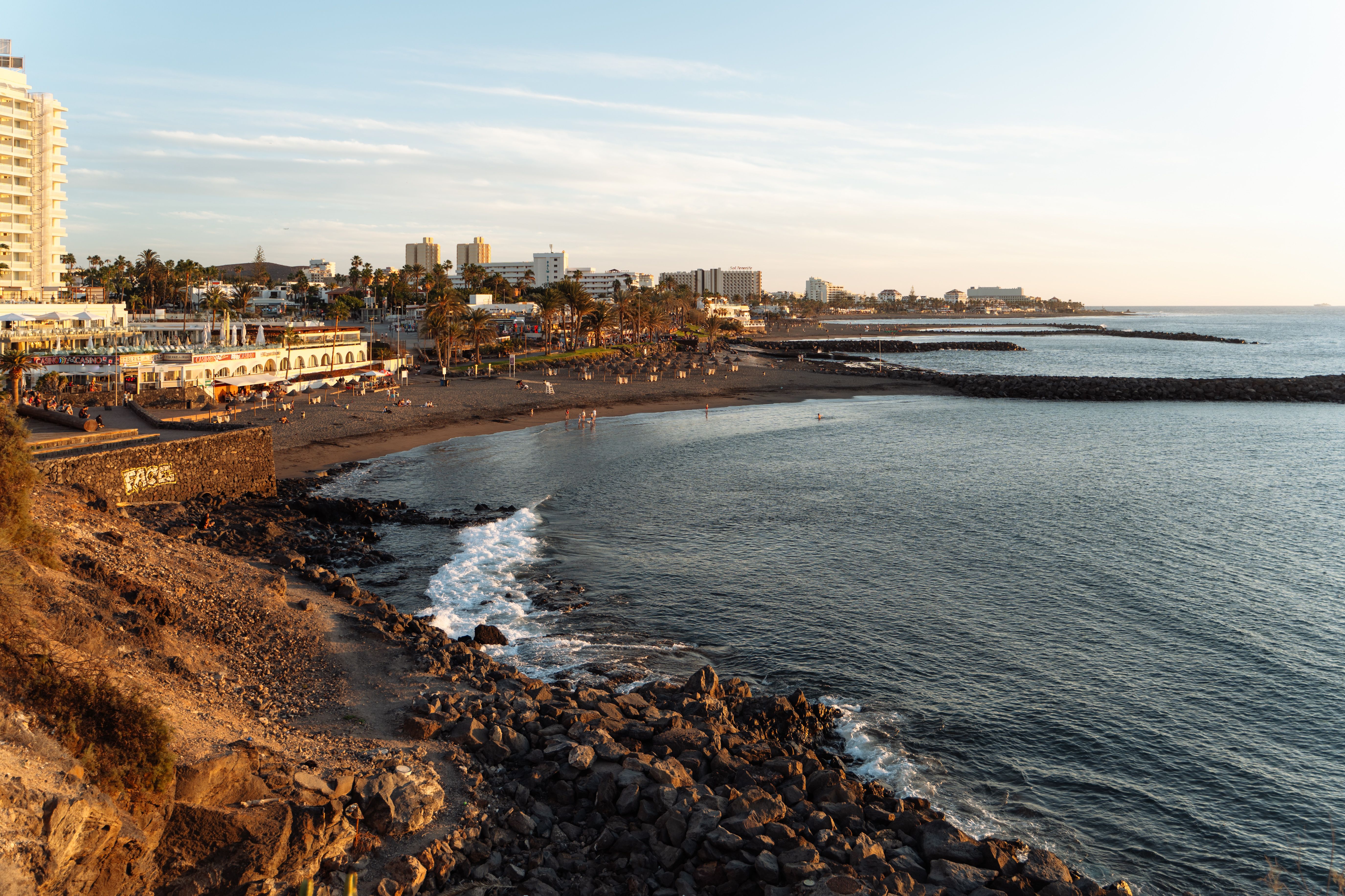 A stunning sunset view over the beach in the Canary Islands, Spain, showcasing tranquil coastal beauty.