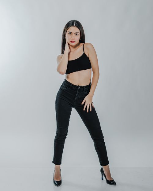 Free A modern portrait highlighting a stylish woman with a confident pose and natural beauty. Stock Photo
