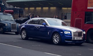 Blue and Silver Rolls Royce Sedan