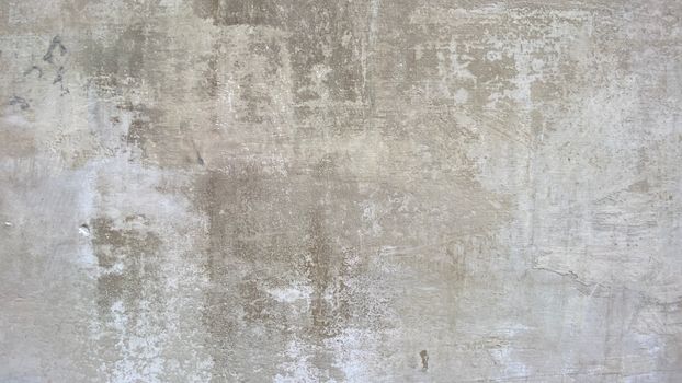 A close-up shot of a textured concrete wall, perfect for backgrounds and designs.