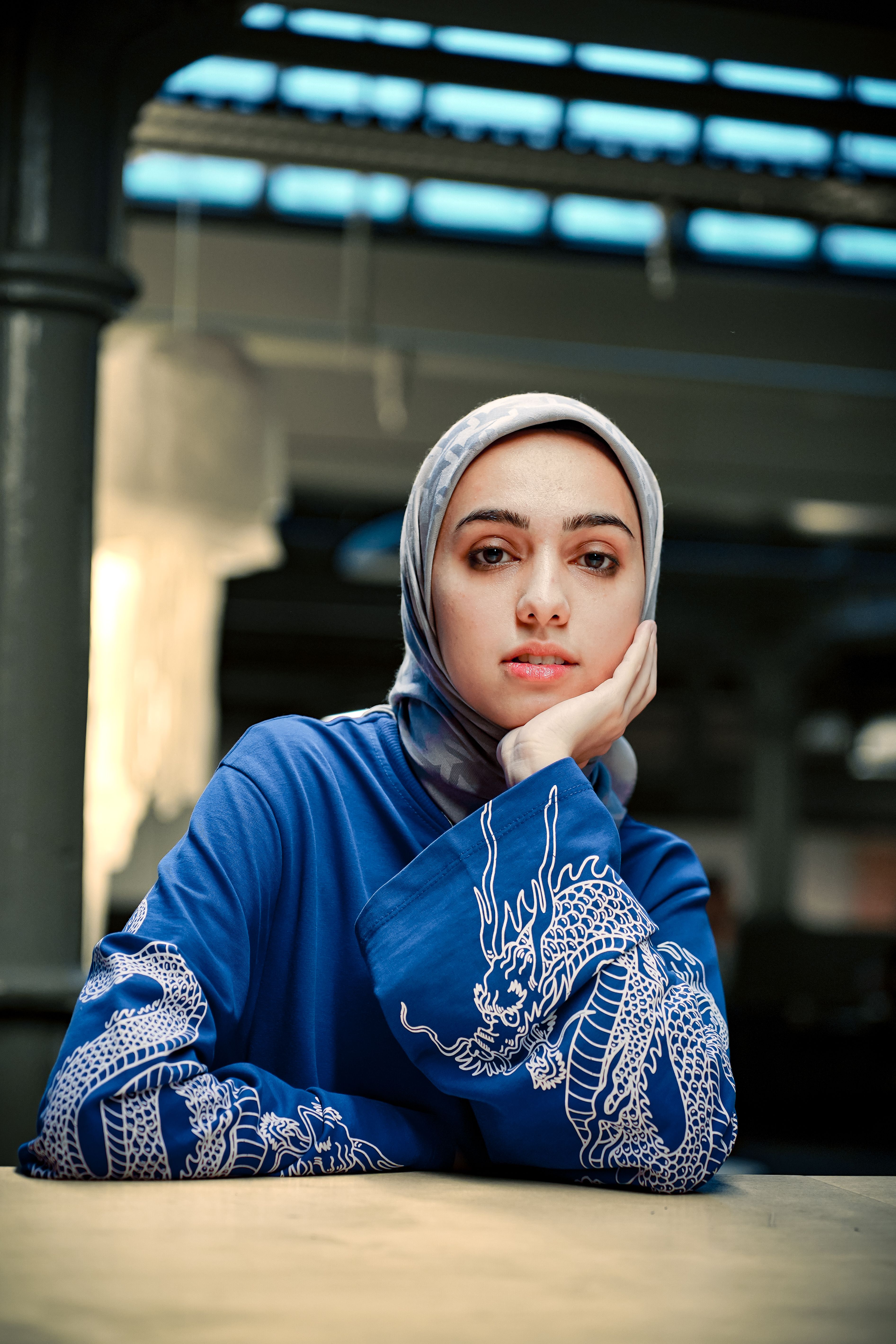 Reflective Portrait of Woman in Blue Hijab · Free Stock Photo