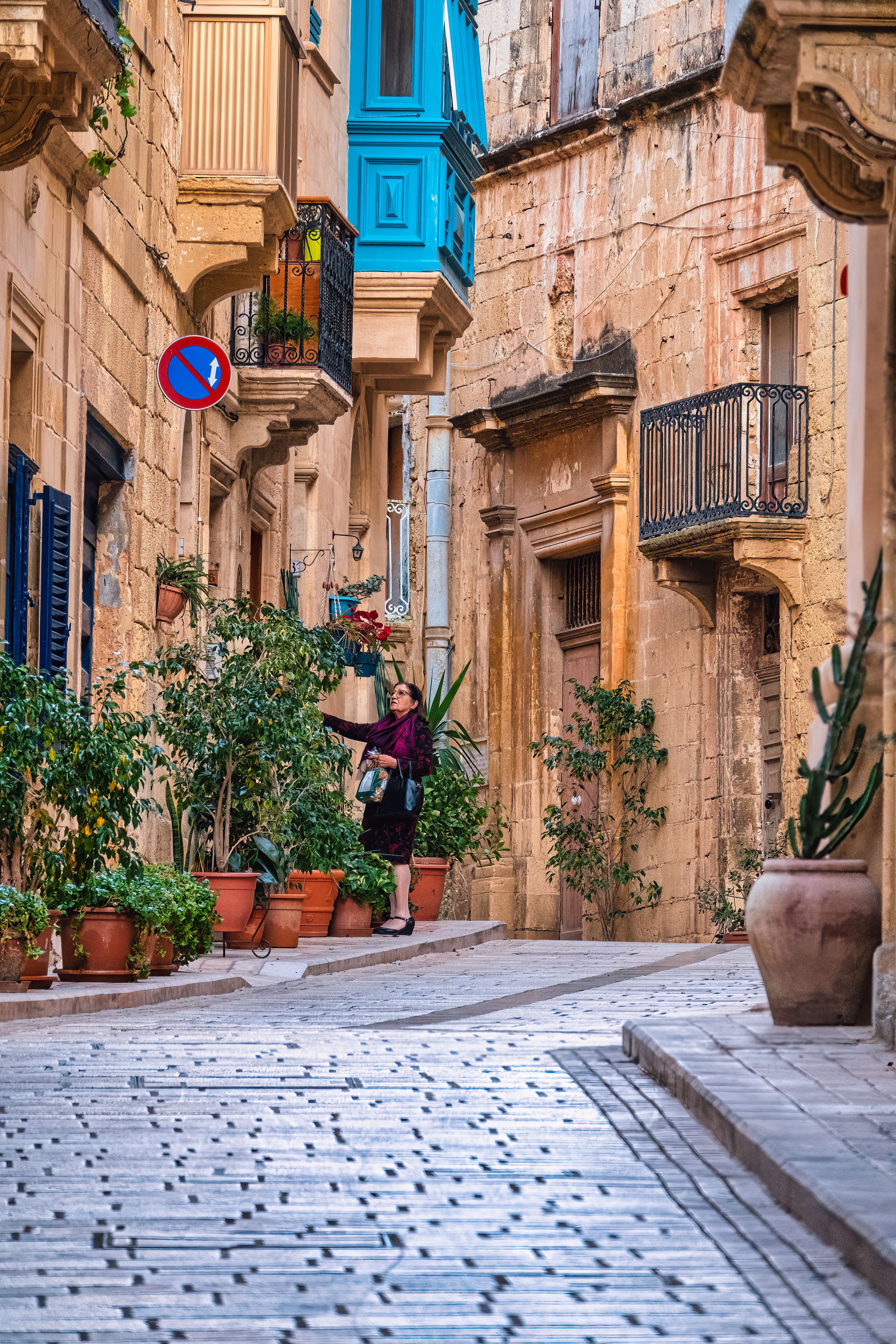 Charming Narrow Street in Malta with Colorful Balconies · Free Stock Photo