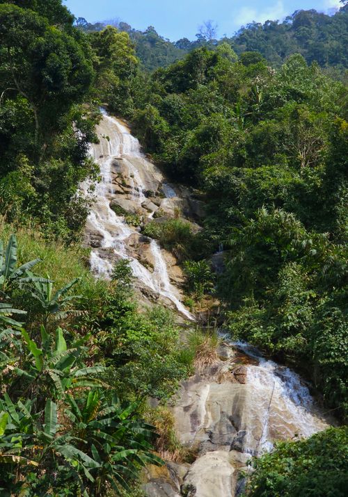 Free Discover the tranquil beauty of a waterfall nestled in the dense, green forests of Kon Tum, Vietnam. Stock Photo