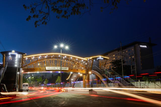 Stunning night cityscape of Guwahati with light trails and illuminated structures.