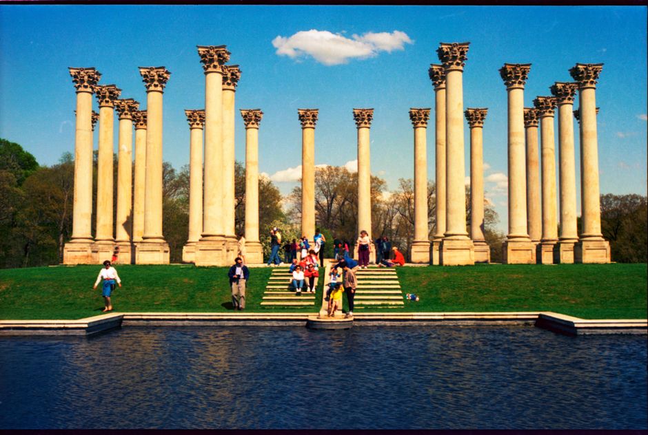 Tourists visit the historic National Capitol Columns in Washington, D.C.