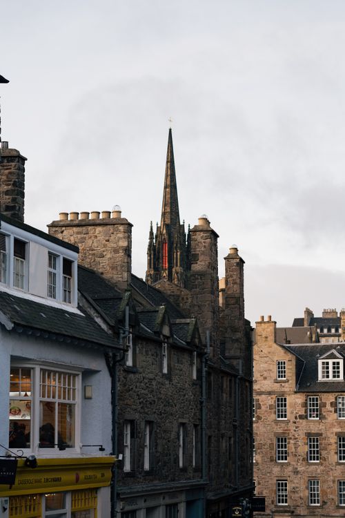 Free Discover the gothic charm of Edinburgh's Old Town with its stunning stone architecture and historic spires. Stock Photo