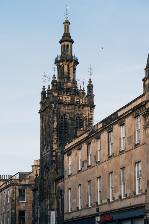 Free View of historic architecture in Edinburgh, Scotland, highlighting detailed Gothic spire. Stock Photo