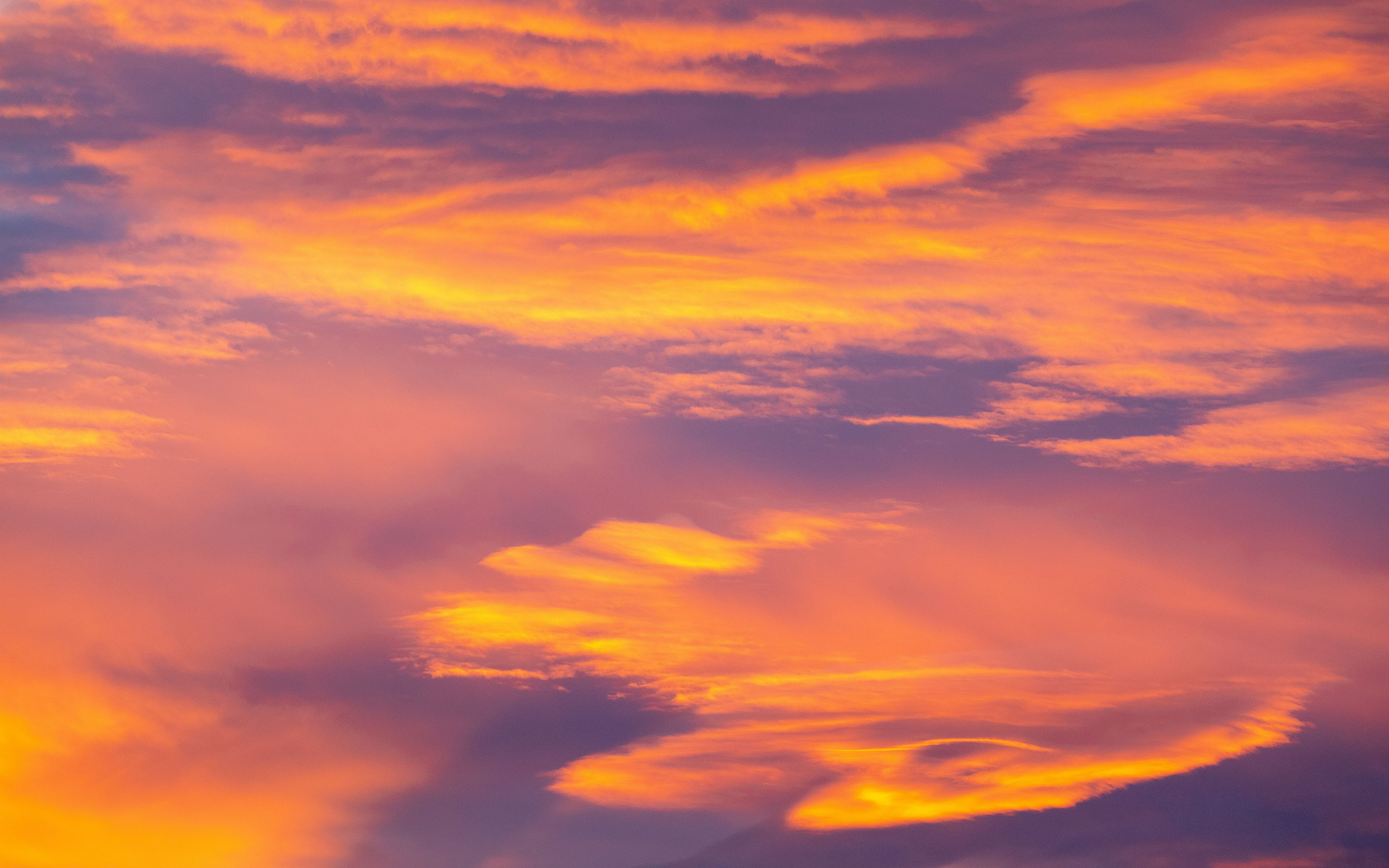 Vibrant Sunset Sky with Golden Clouds · Free Stock Photo