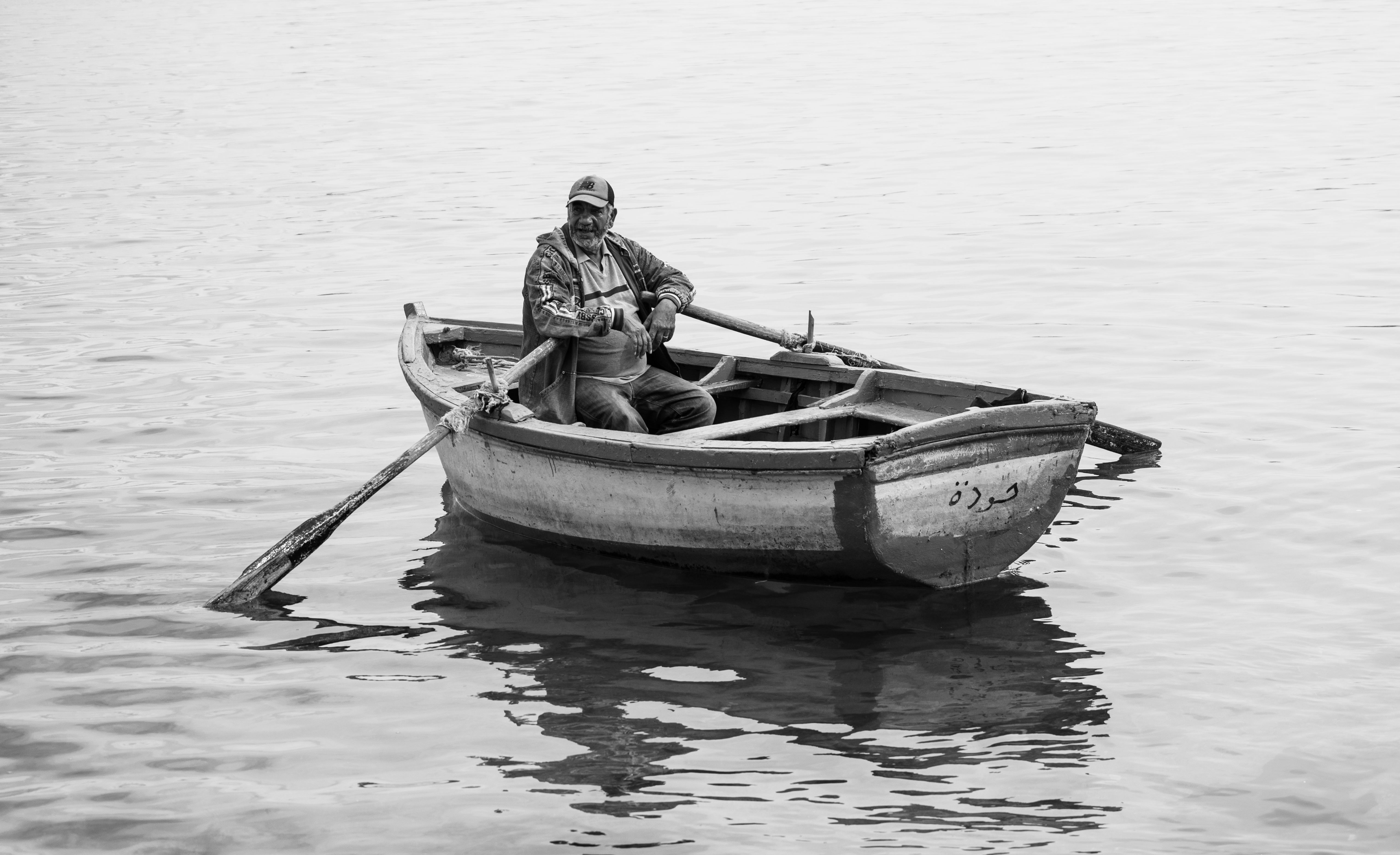 Fisherman Rowing on Calm Sea in Alexandria · Free Stock Photo