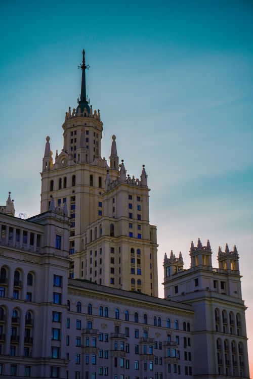 Free Stunning capture of Soviet-era Stalinist architecture against a sunset sky. Stock Photo
