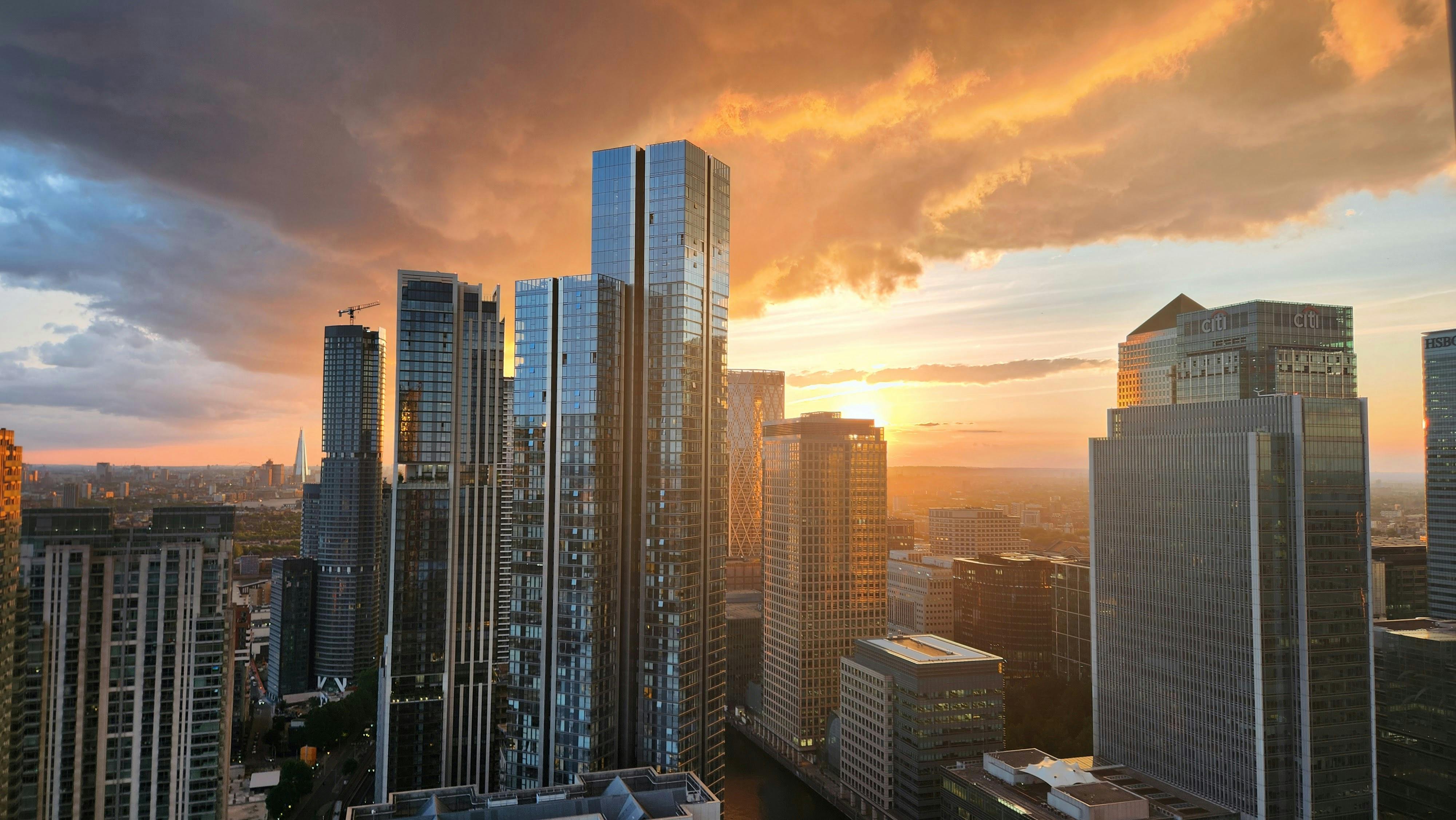 Top view of various smartphones and tech on a minimalistic layout.