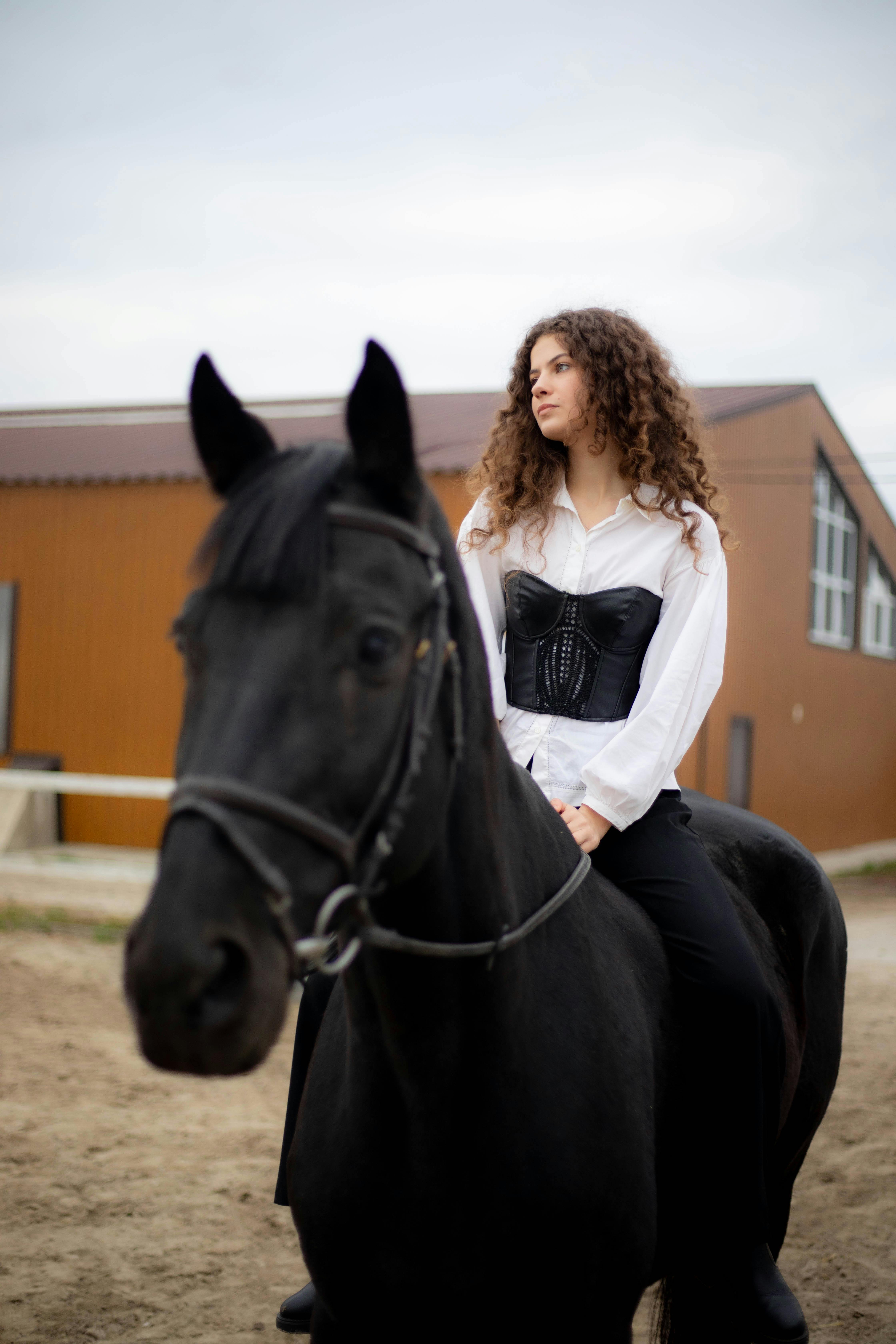 Photo of Person Riding a Horse · Free Stock Photo