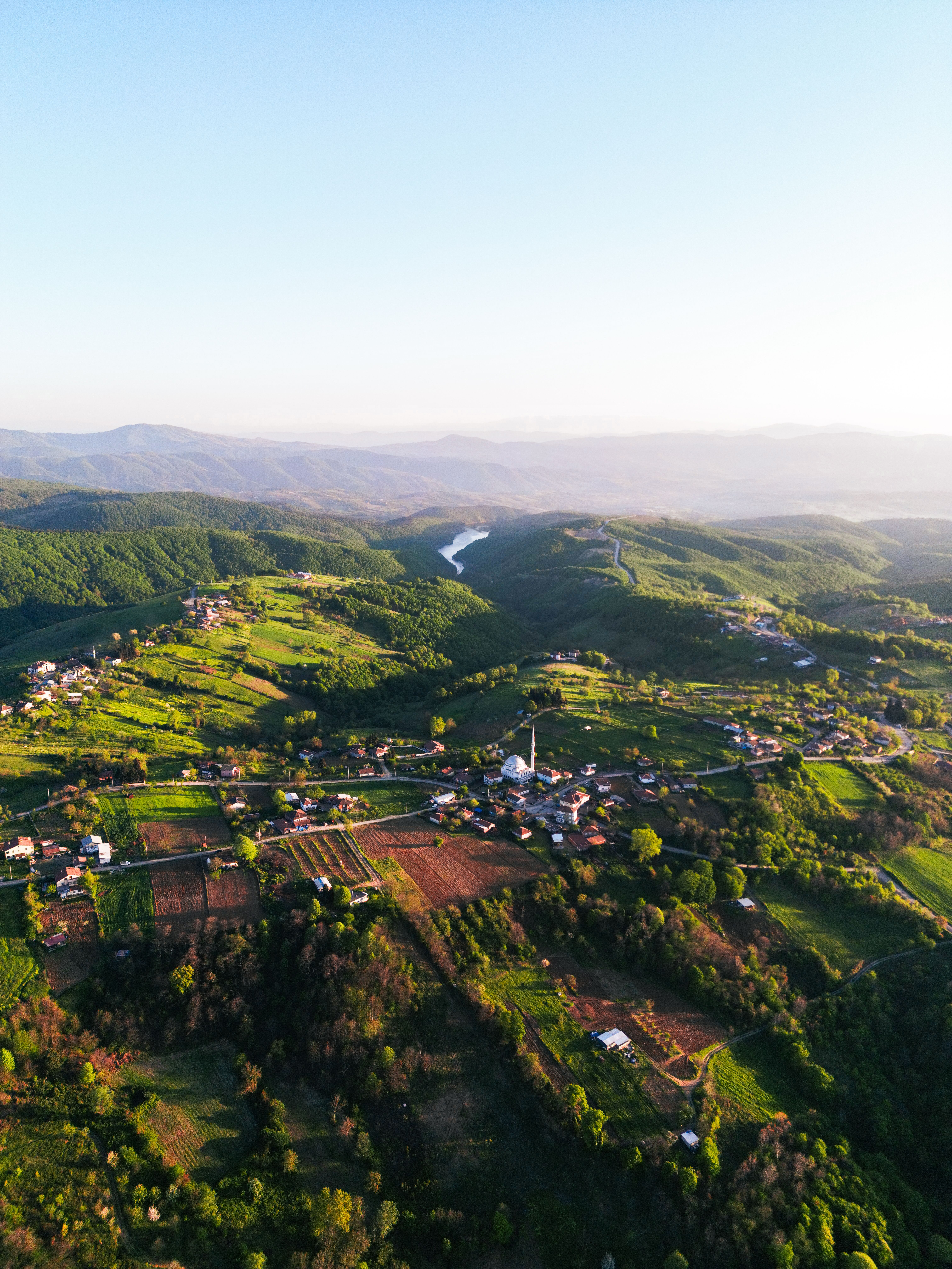 Aerial View of Rustic Village Landscape in Spring · Free Stock Photo