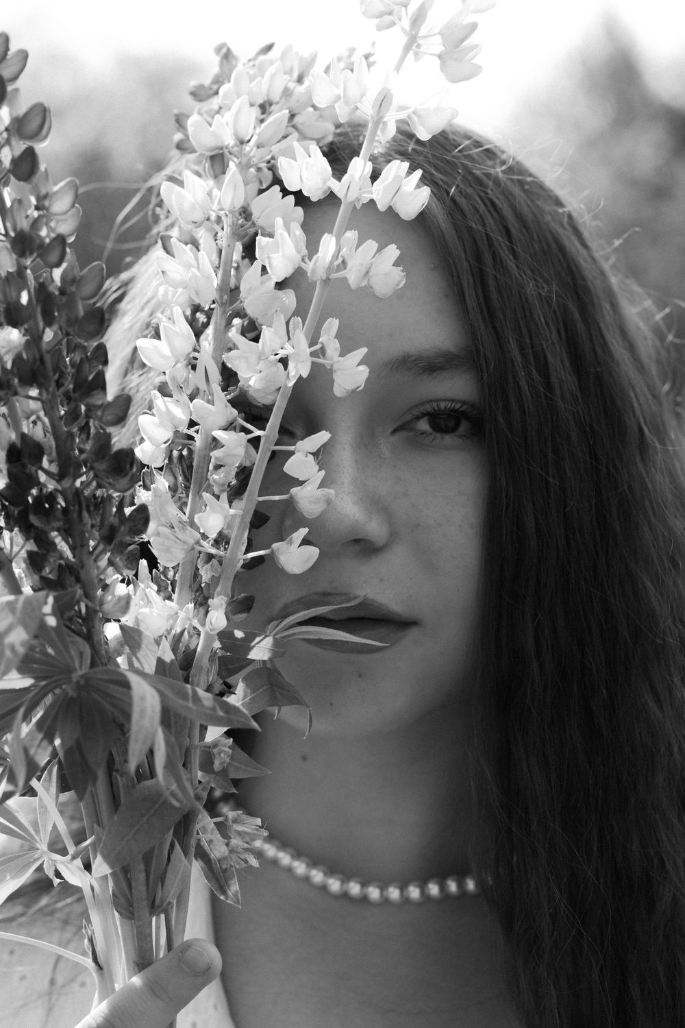 Black and White Portrait with Flowers · Free Stock Photo