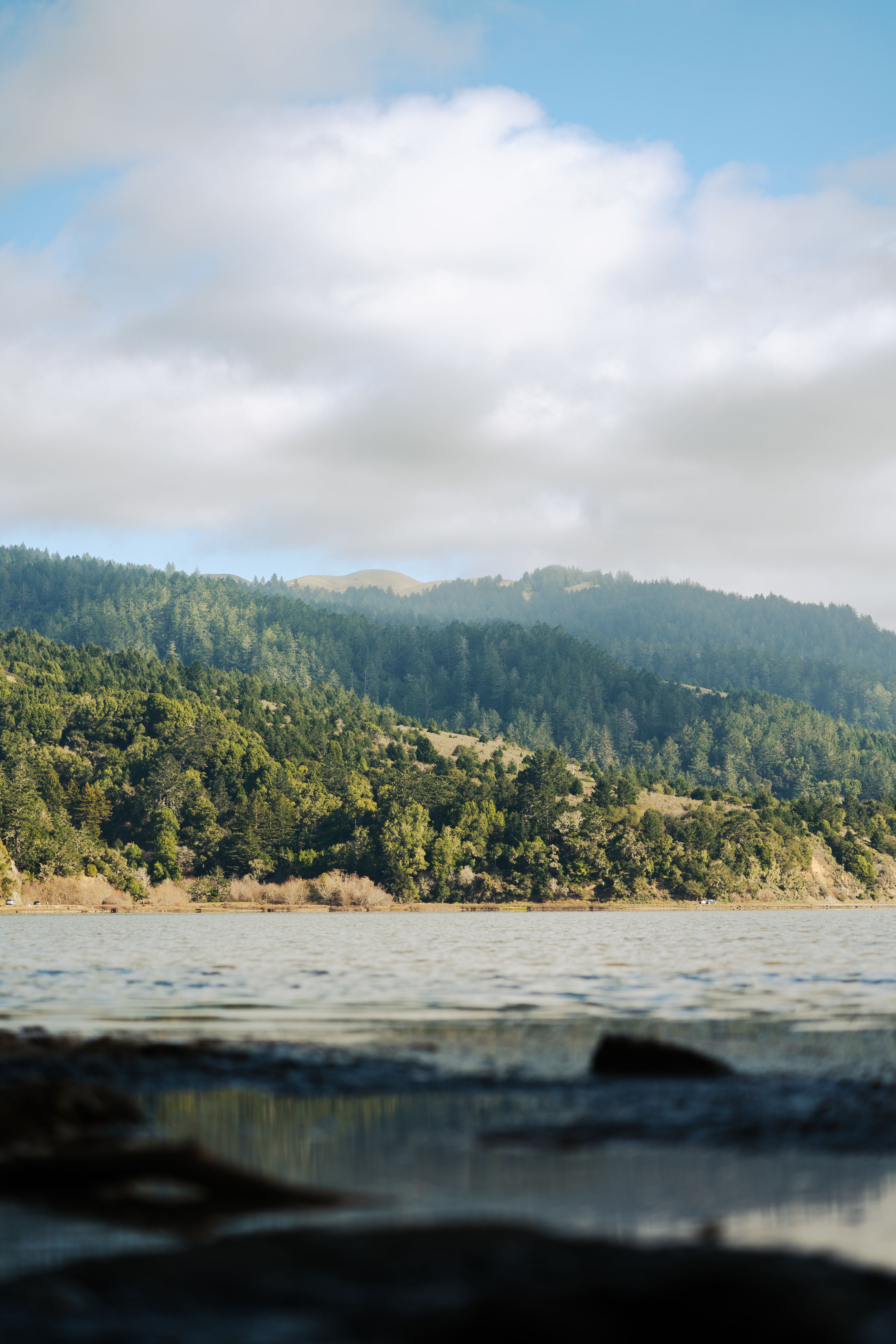 Serene Mountain Lake Under Blue Sky · Free Stock Photo