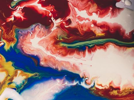 Dynamic and colorful abstract acrylic painting with swirling vibrant hues creating a fluid art expression.