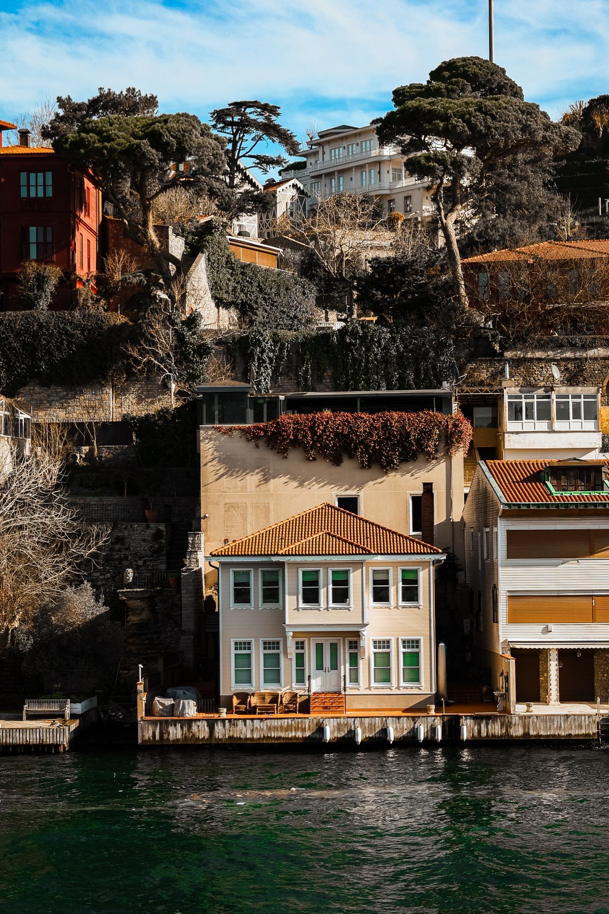 Rustic Waterfront Charming Waterfront House with Rustic Architecture · Free Stock Photo