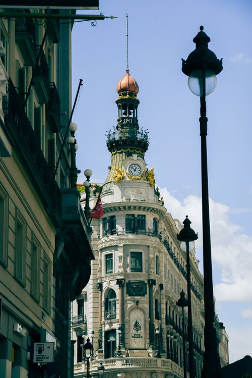 Free Gran Via architecture in Madrid, Spain, showcasing classic design and urban street view. Stock Photo