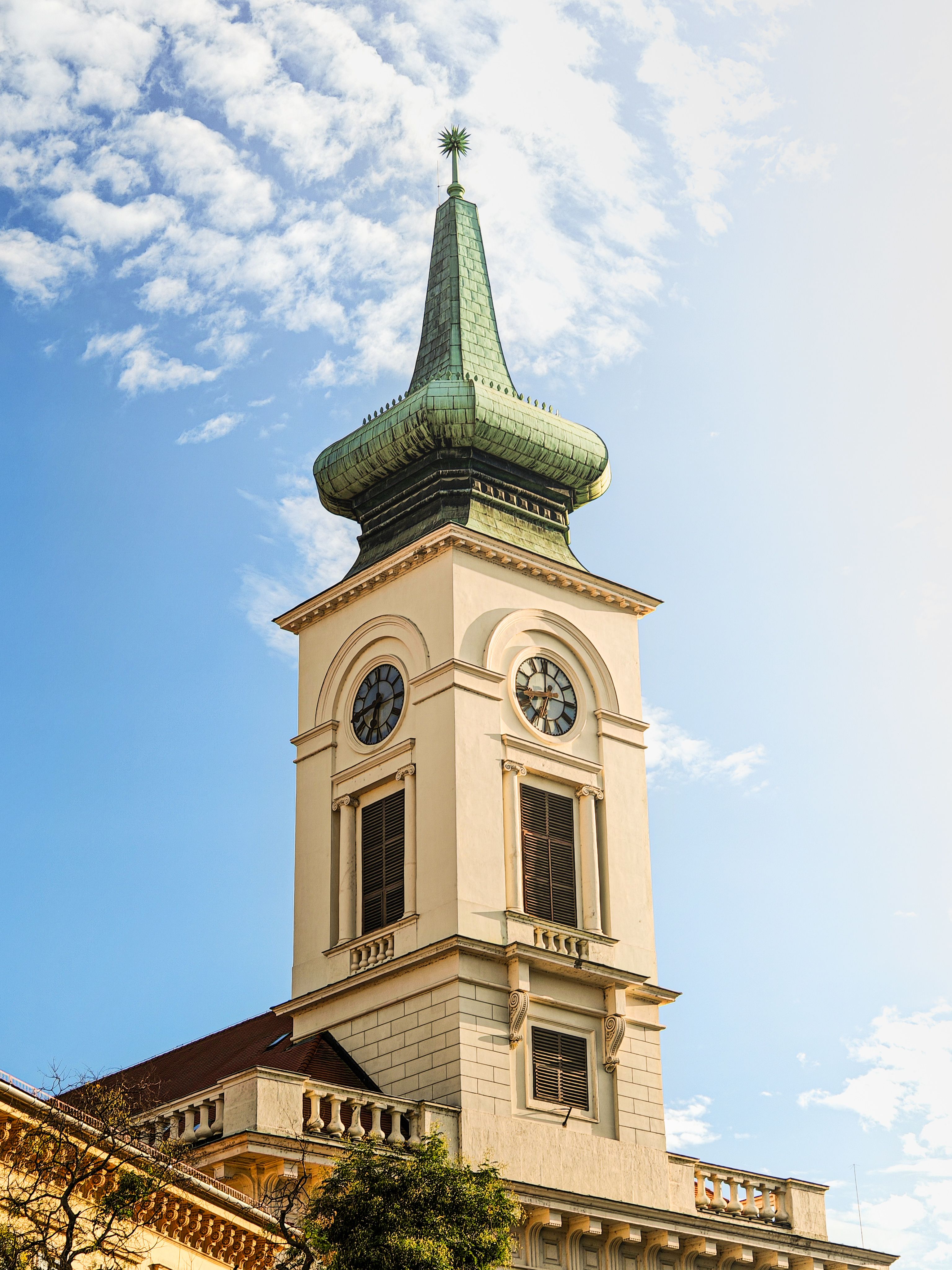 Historic Clock Tower Against Clear Sky · Free Stock Photo