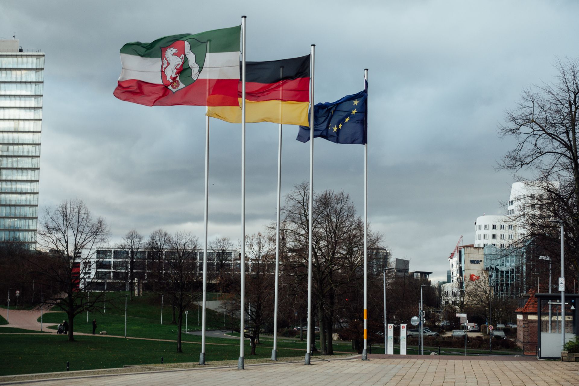 A diplomatic meeting table set with flags