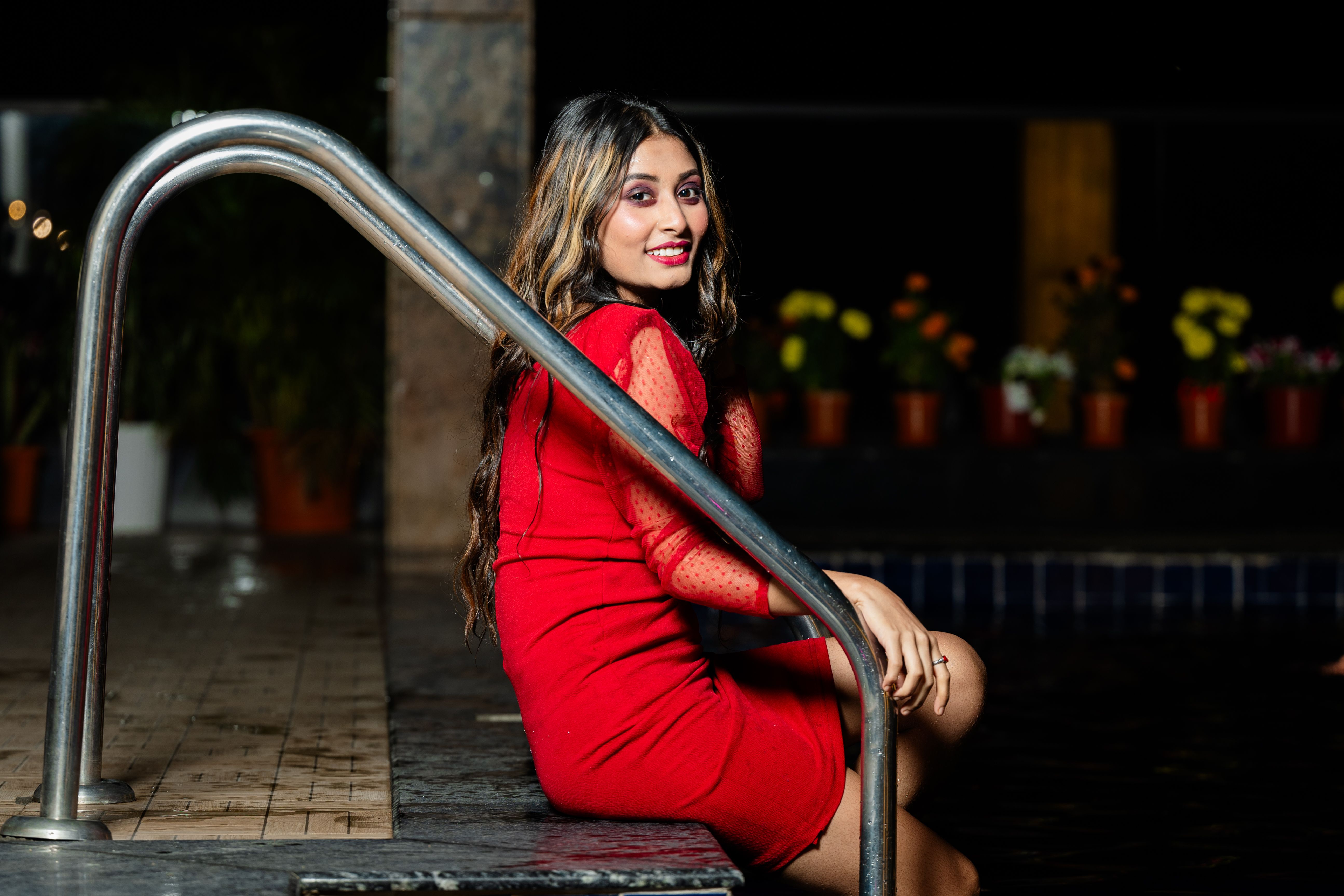Elegant Woman in Red Dress by Poolside · Free Stock Photo
