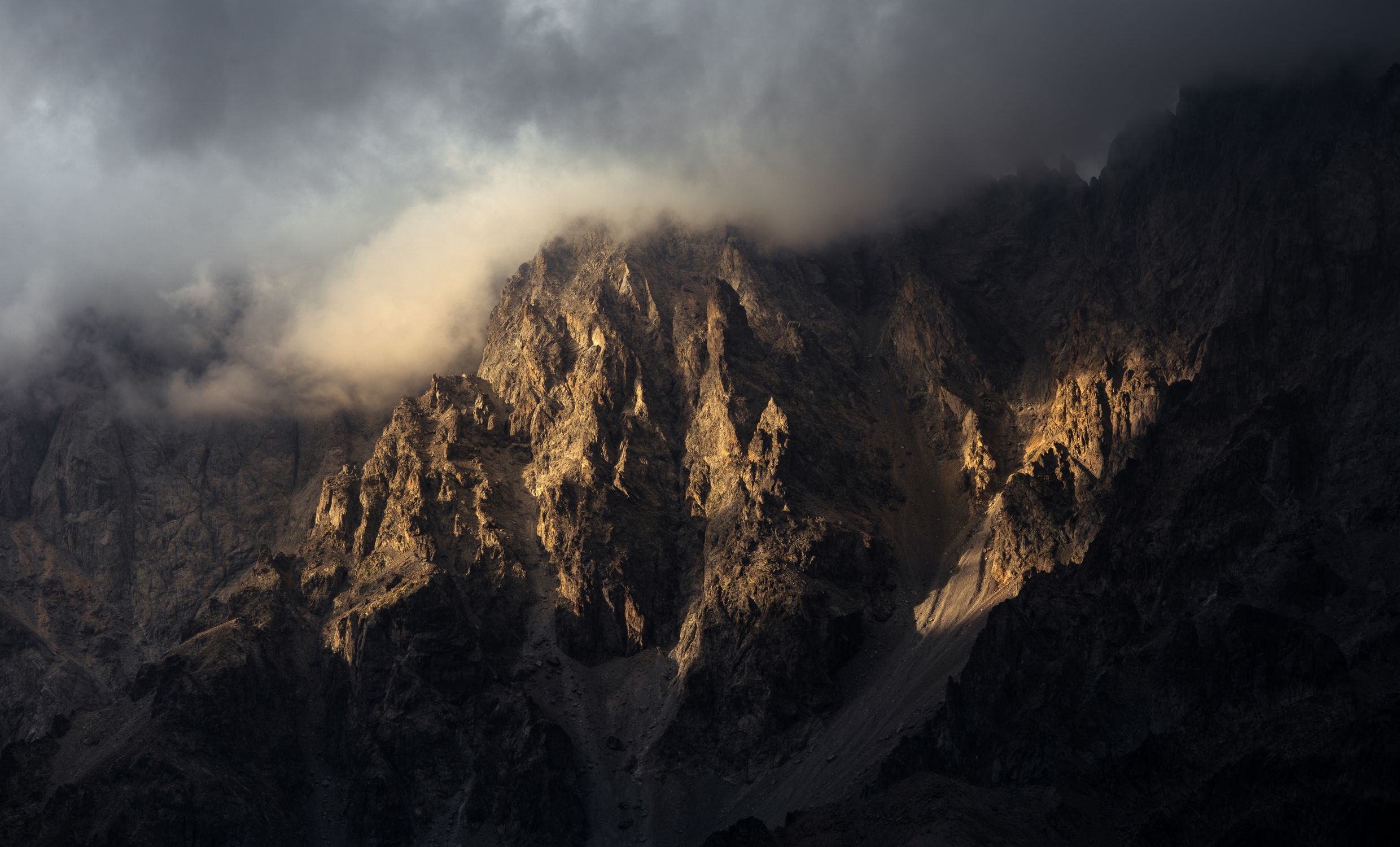 Dramatic Mountain Peaks under Cloudy Sky · Free Stock Photo