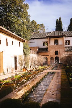 Capture of Alhambra's beautiful gardens in Granada, Spain on a sunny spring day.