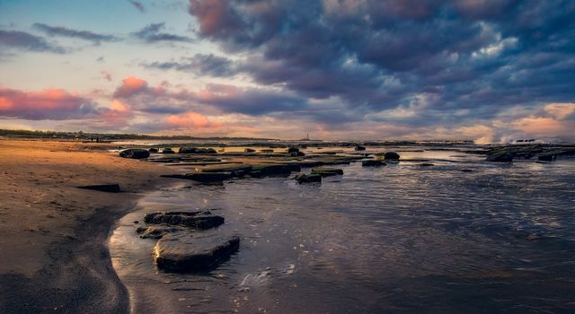 Stunning coastal scene with vibrant sky and sea, capturing the essence of nature.