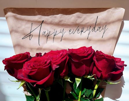 Bouquet of red roses with 'Happy everyday' message, perfect for gifting and celebrations.