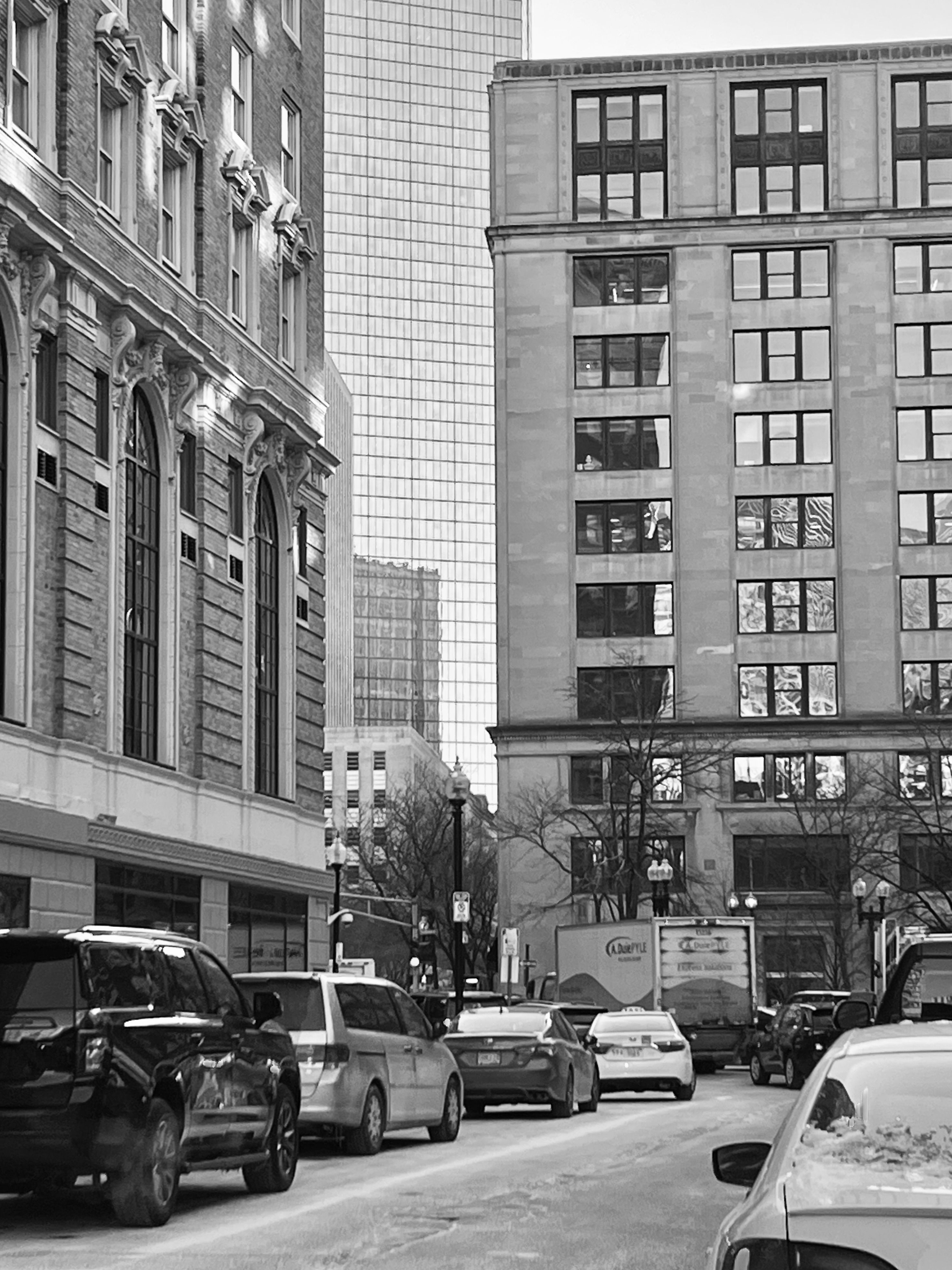 Black and White Urban Street Scene with Skyscrapers · Free Stock Photo