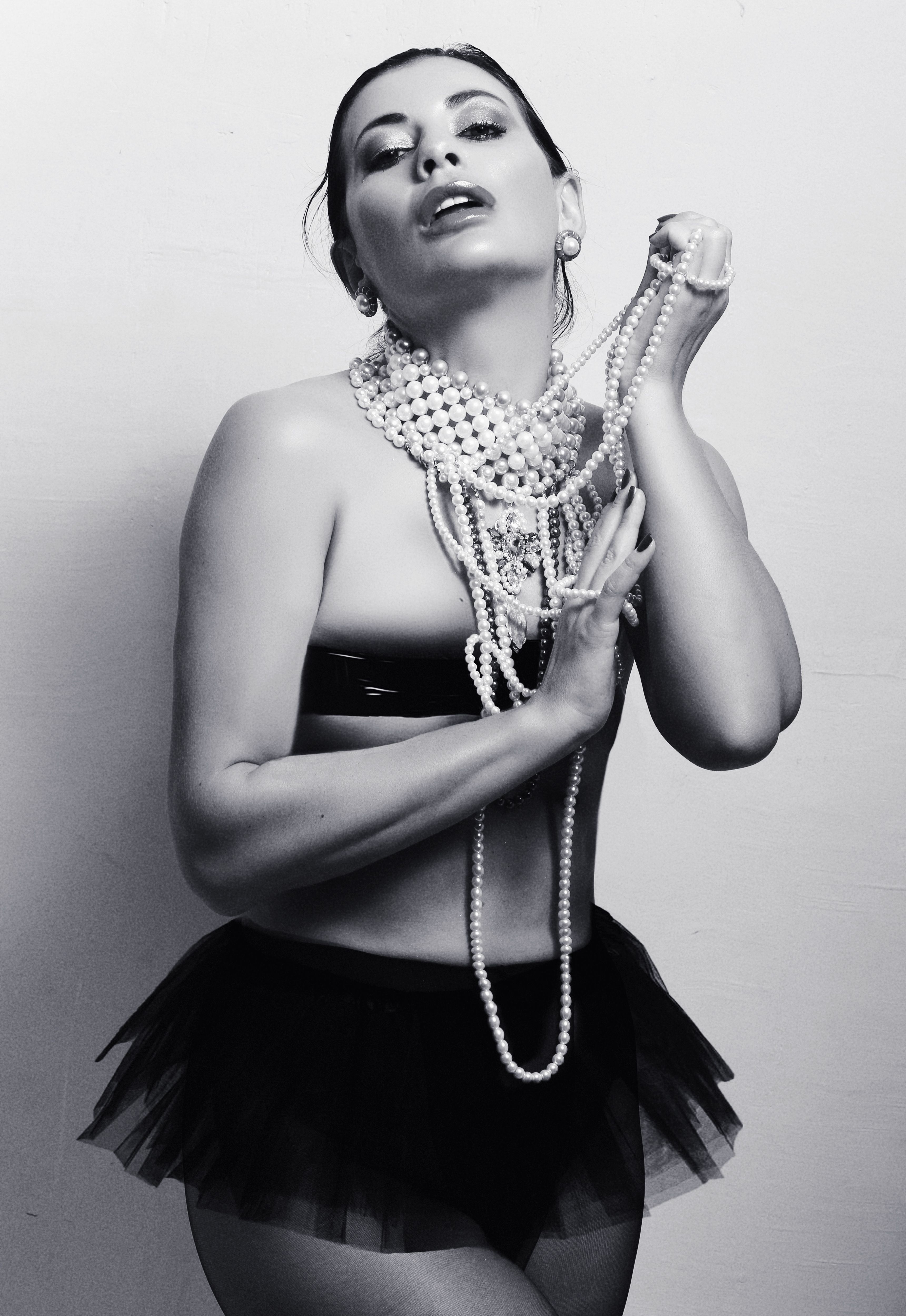 Elegant Portrait of Woman with Pearl Necklace · Free Stock Photo