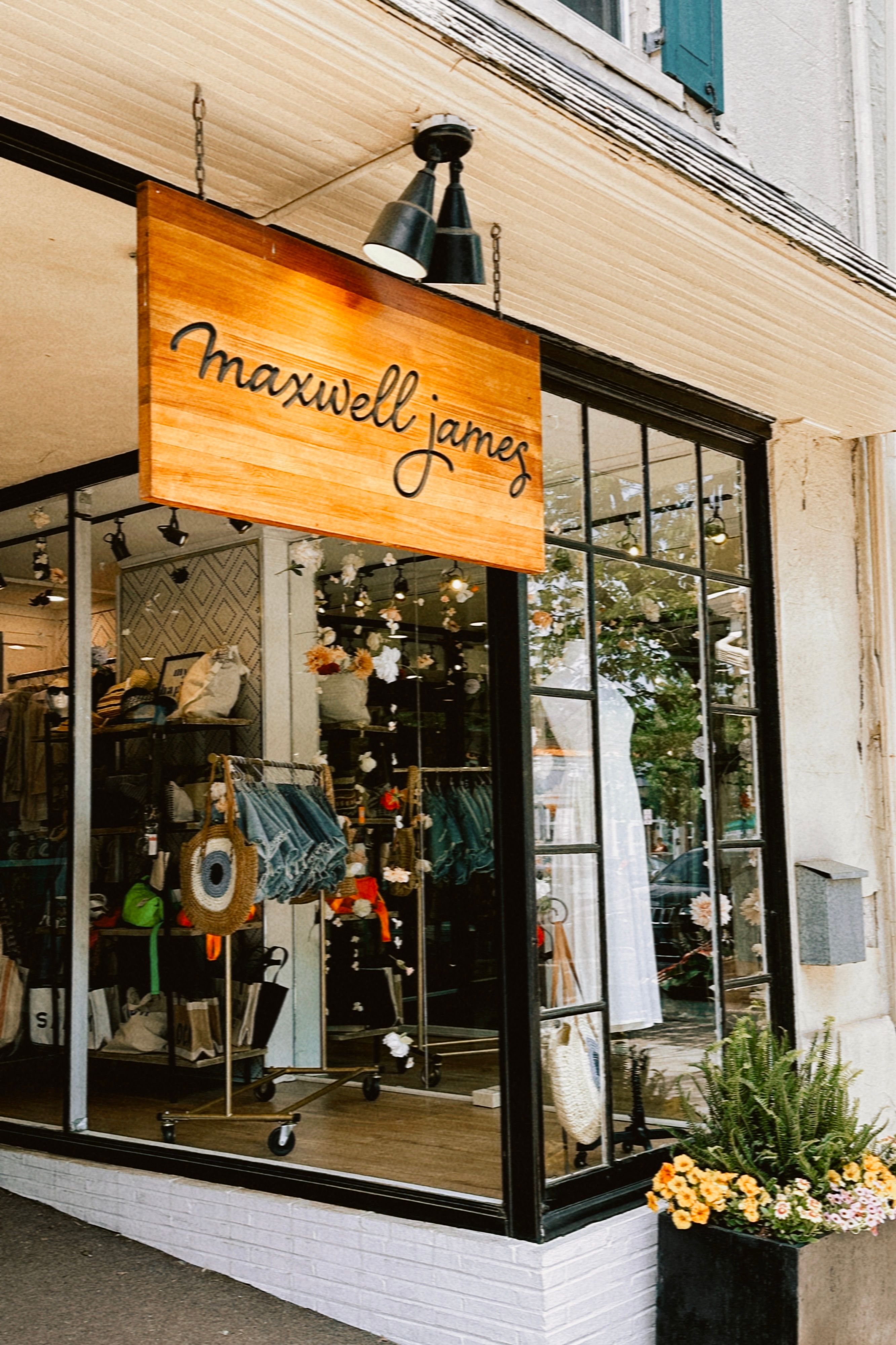 Chic Boutique Storefront with Wooden Signage · Free Stock Photo