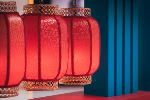 Close-up of traditional red lanterns with intricate designs for Lunar New Year celebration