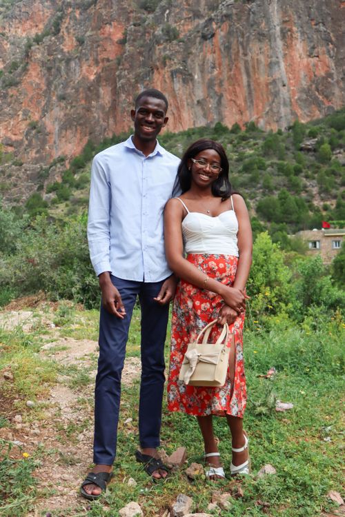 Free Happy couple enjoying the lush greenery of Akchour, Morocco. Stock Photo